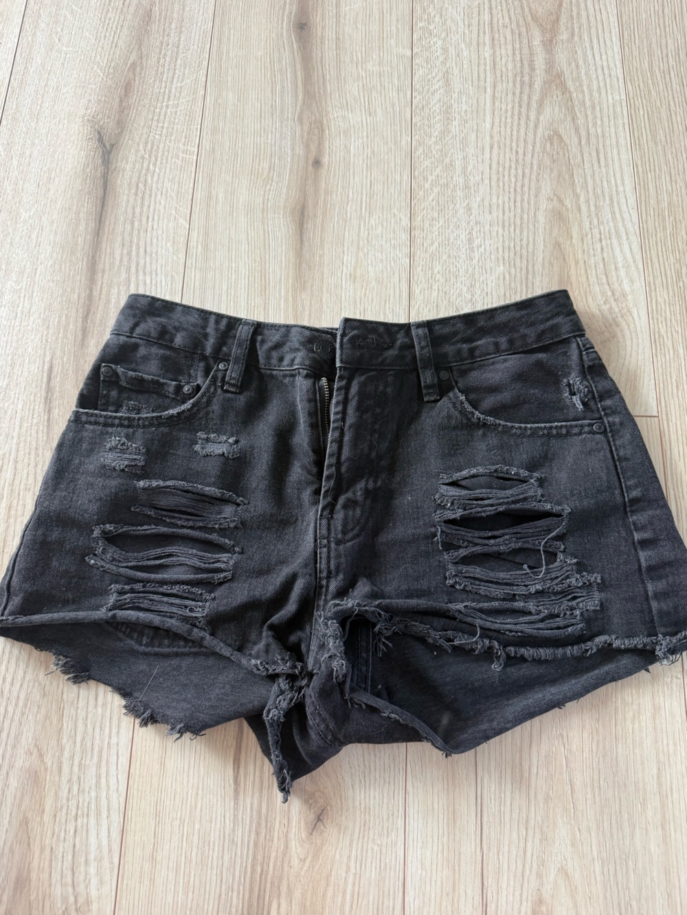 black holed jeans shorts